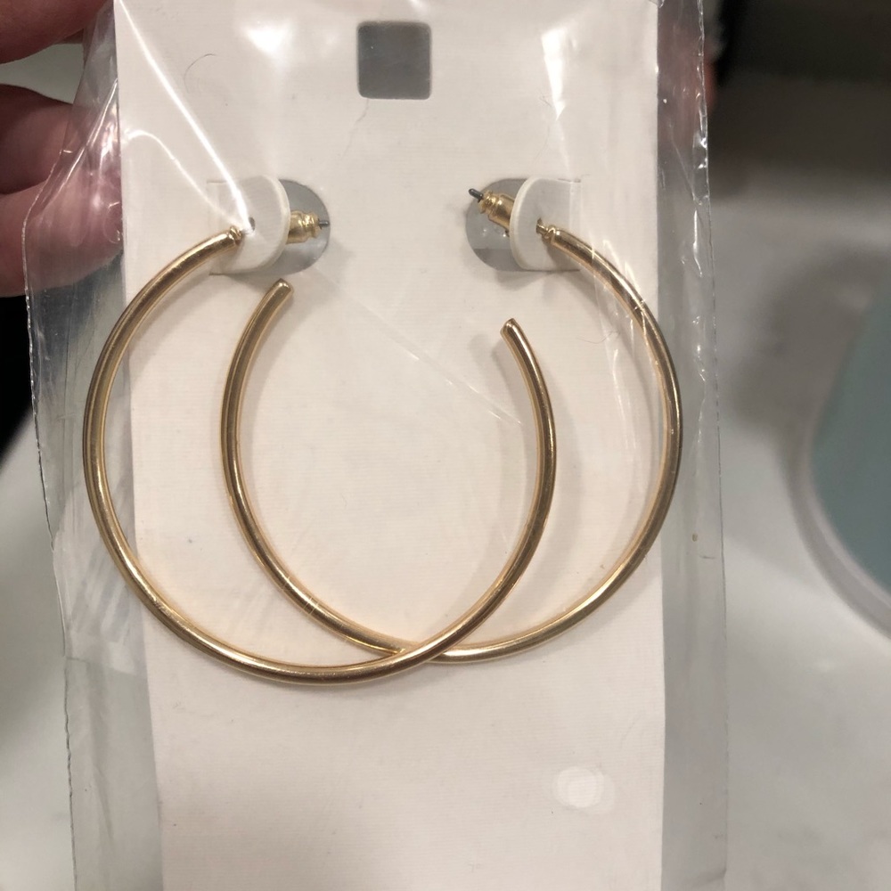 Brand new gold hoop earrings! Never opened